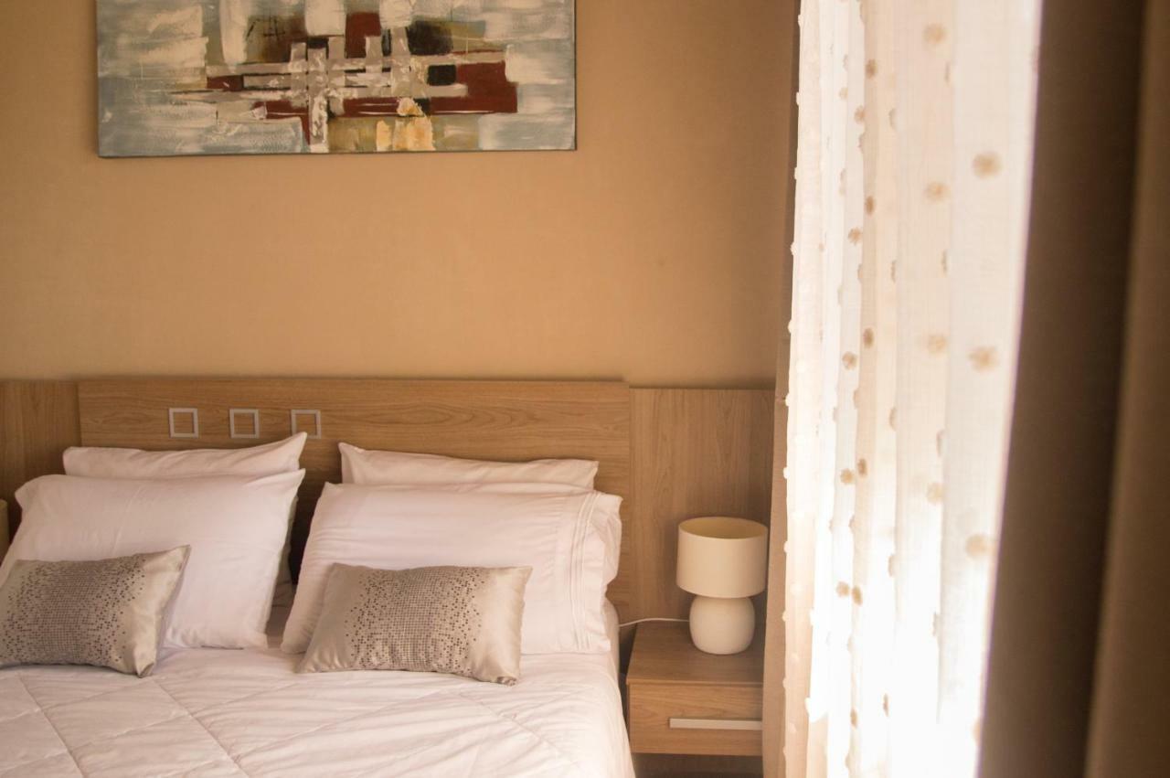 Aparthotel La Riviera à Fernando de la Mora Extérieur photo